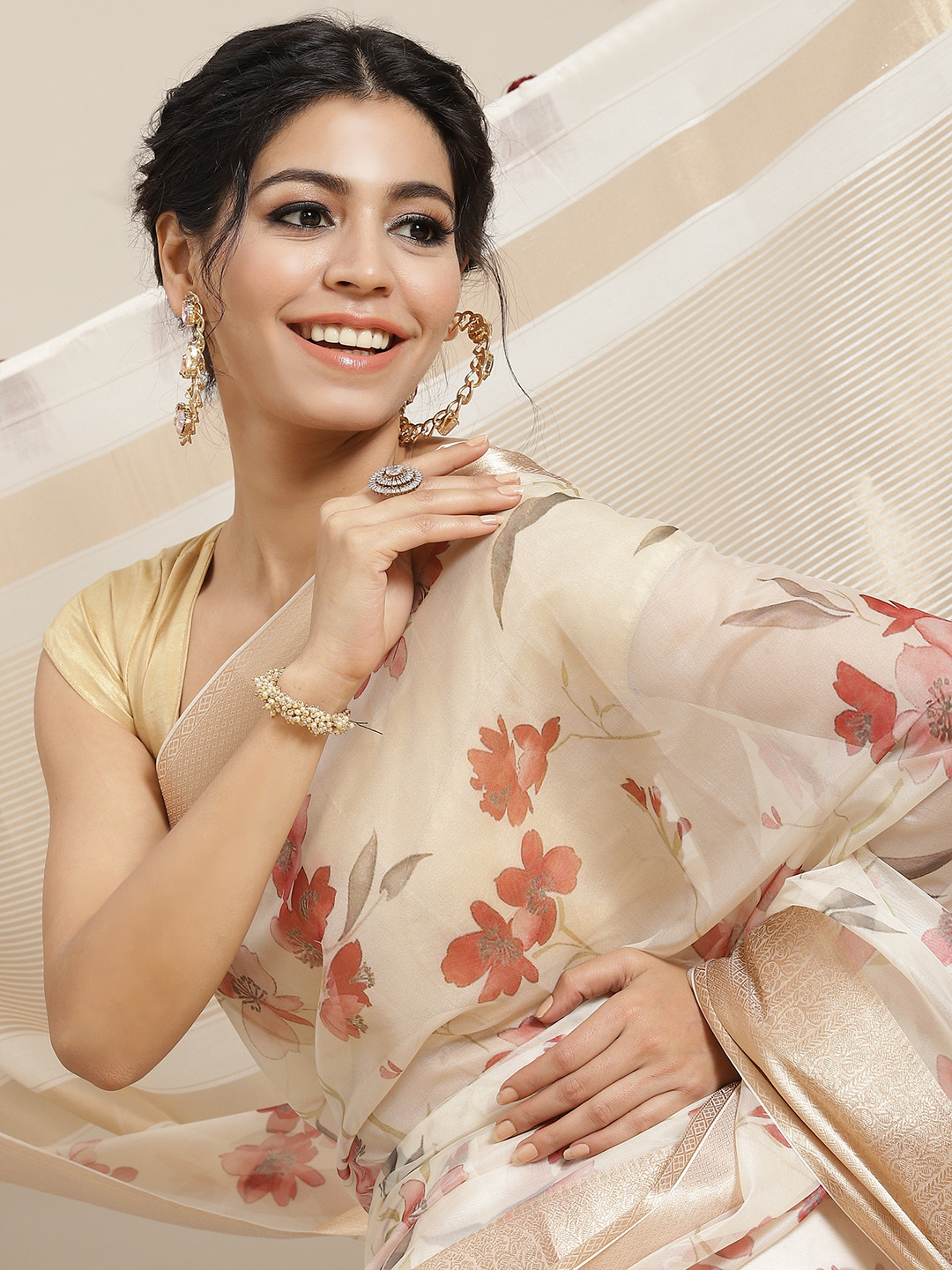 

Mitera Beige & Coffee Brown Floral Organza Saree