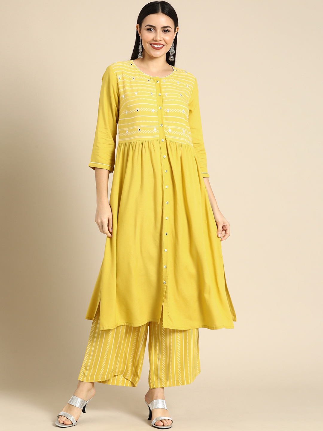 

all about you Women Yellow Ethnic Motifs Printed Mirror Work Kurta with Palazzos