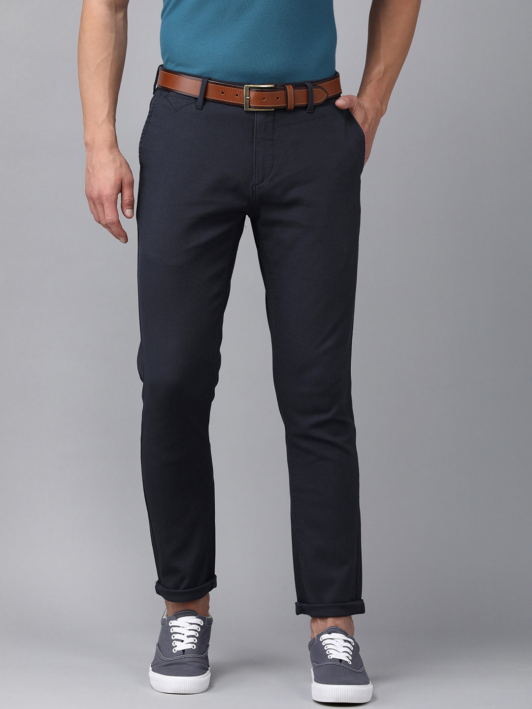

U.S. Polo Assn. Men Navy Blue Self-Design Austin Trim Fit Regular Trousers