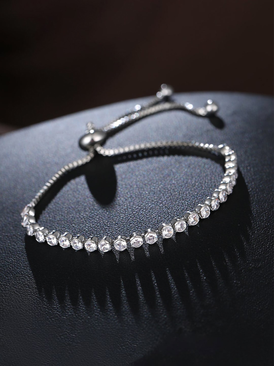 

Yellow Chimes Women Silver-Plated & White Crystals Bracelet