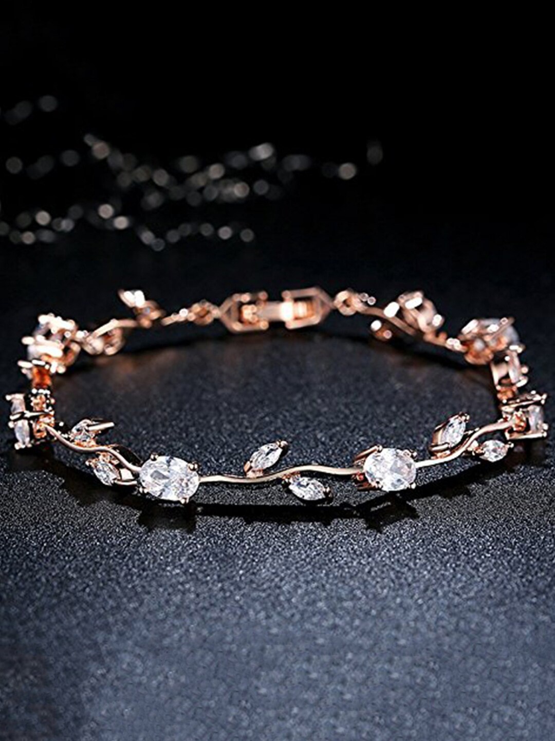 

Yellow Chimes Women Rose Gold white Crystals studded Bracelet