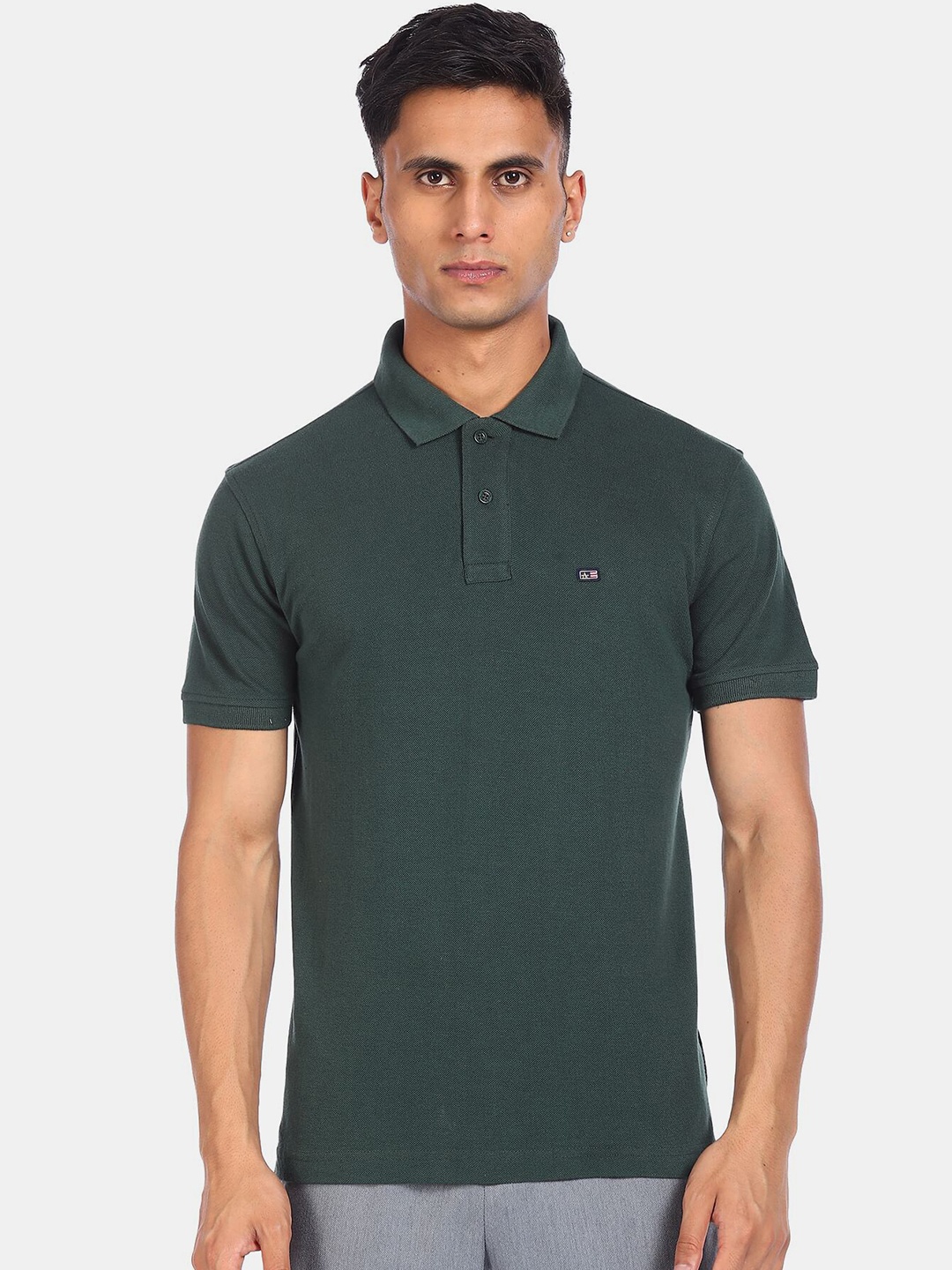 

Arrow Sport Men Green Polo Collar Pure Cotton T-shirt