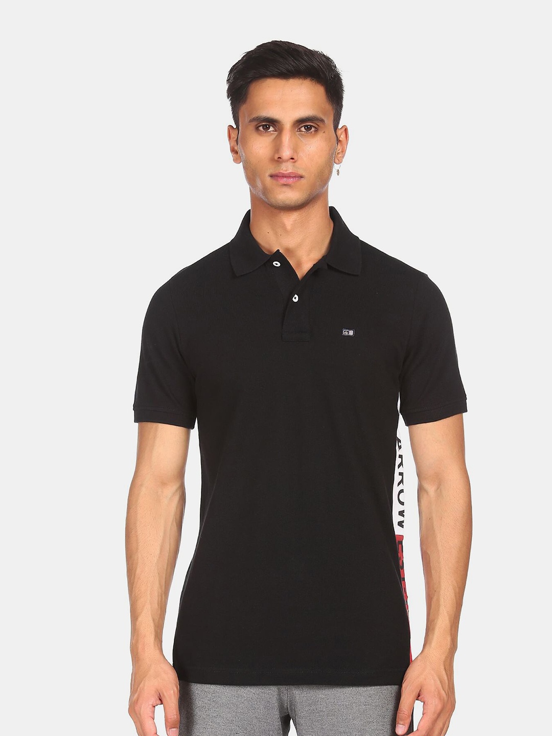 

Arrow Sport Men Black Typography Polo Collar Pure Cotton T-shirt