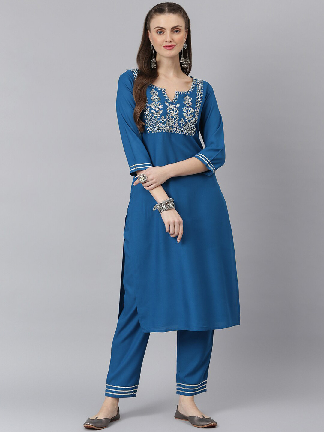

Stylum Women Teal Ethnic Motifs Embroidered Kurta with Trousers