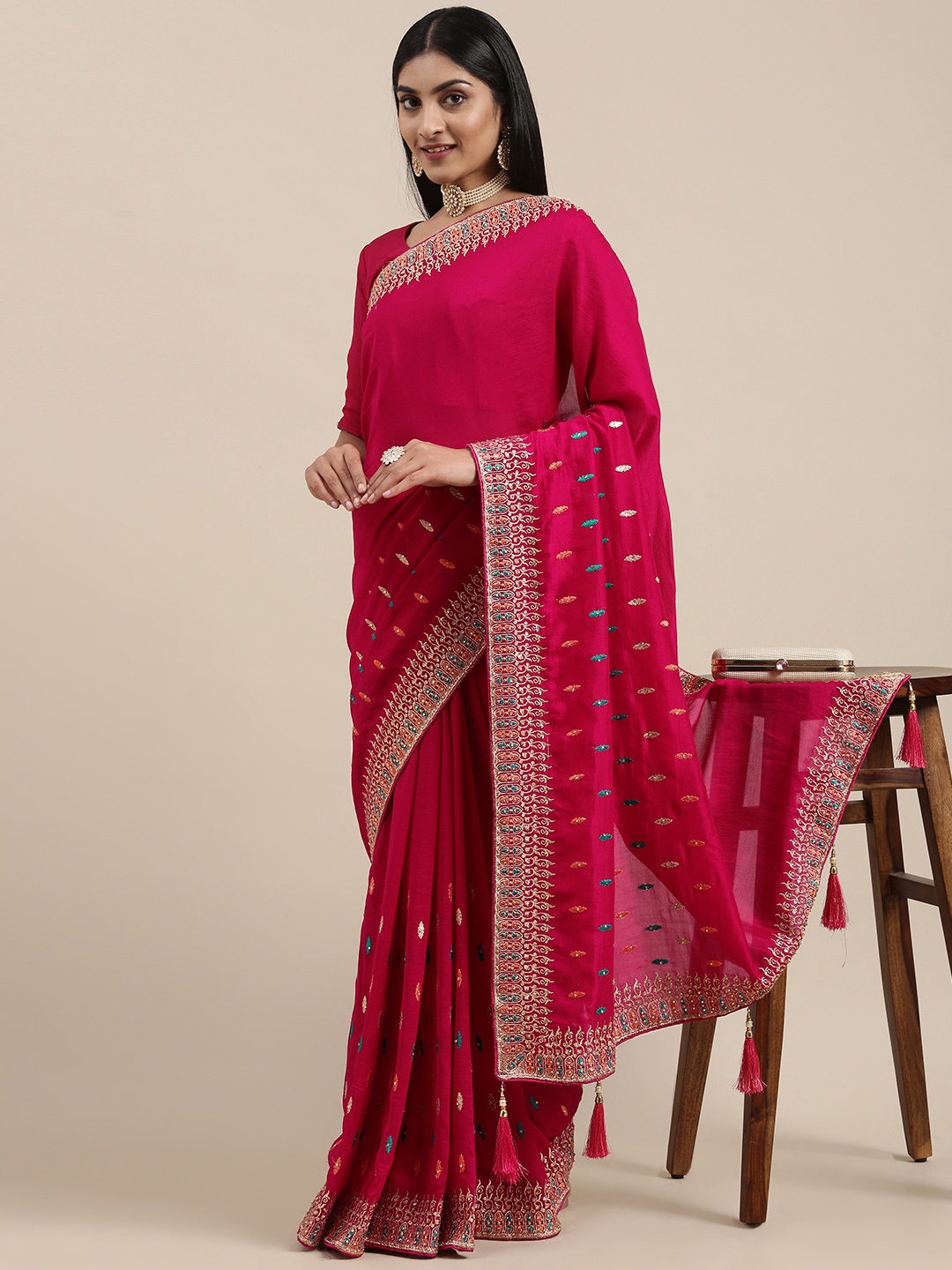 

Mitera Pink Ethnic Motifs Silk Blend Saree