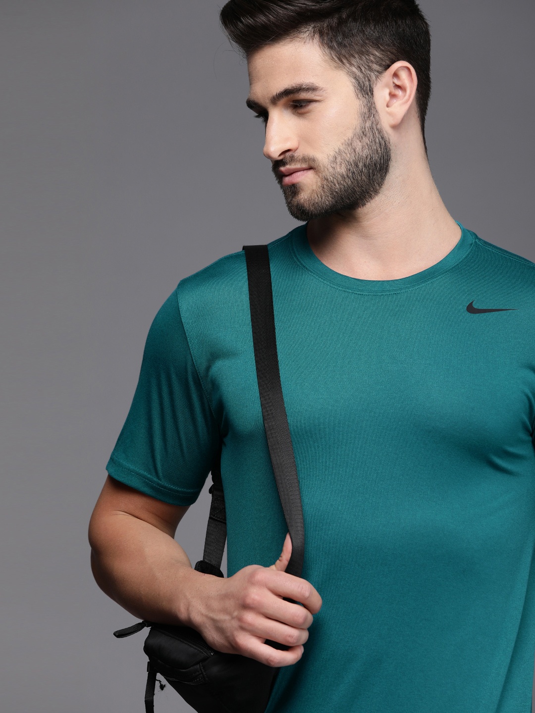 

Nike Men Teal Solid Round-Neck Running Sports T-shirt