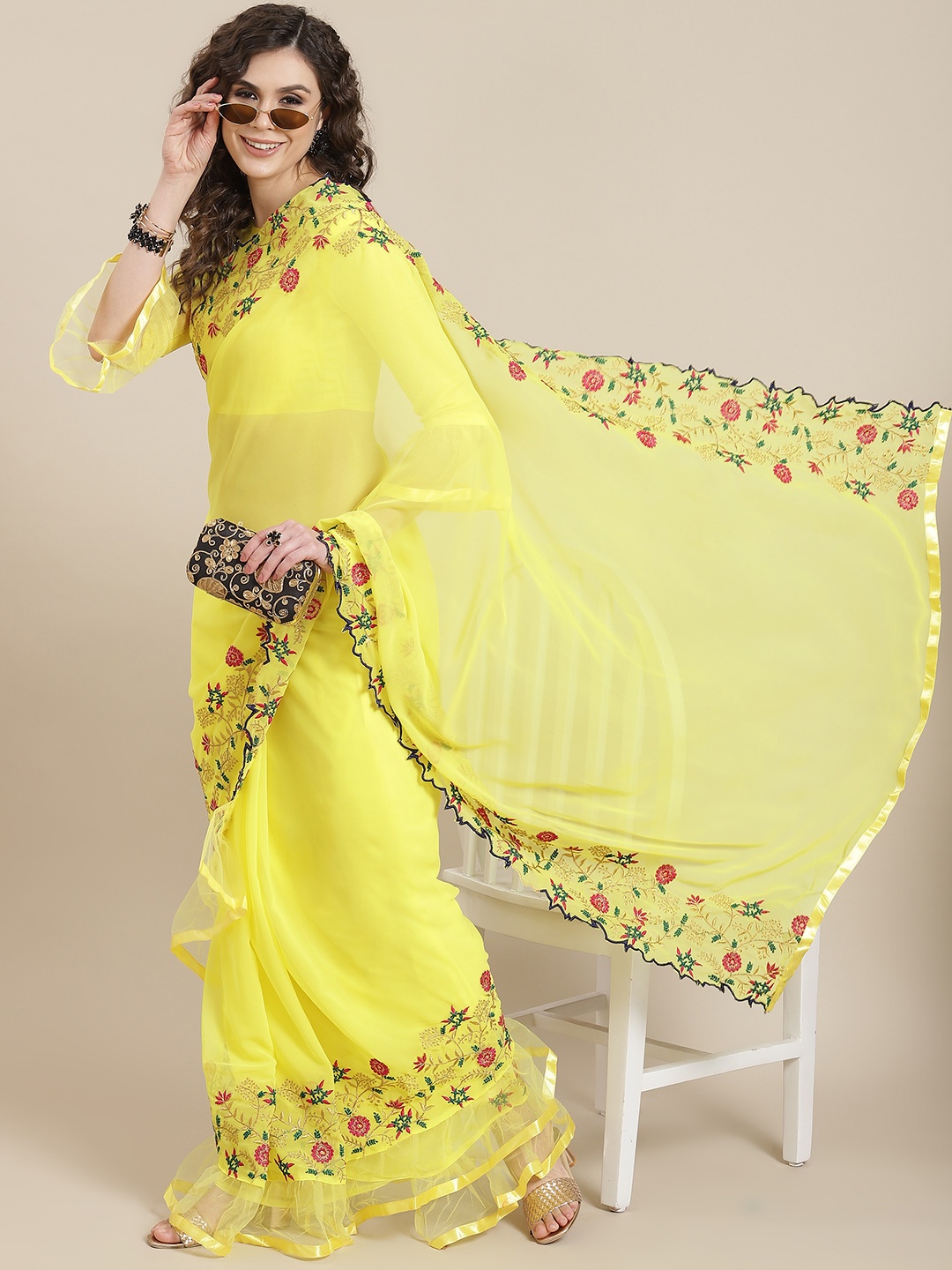 

Mitera Women Yellow & Red Embellished Embroidered Ruffle Saree