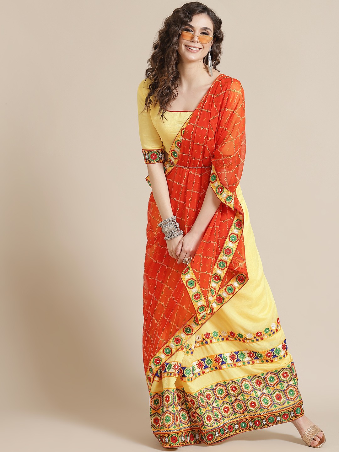 

Mitera Women Orange & Yellow Ethnic Motifs Half and Half Bandhani Stylized Saree