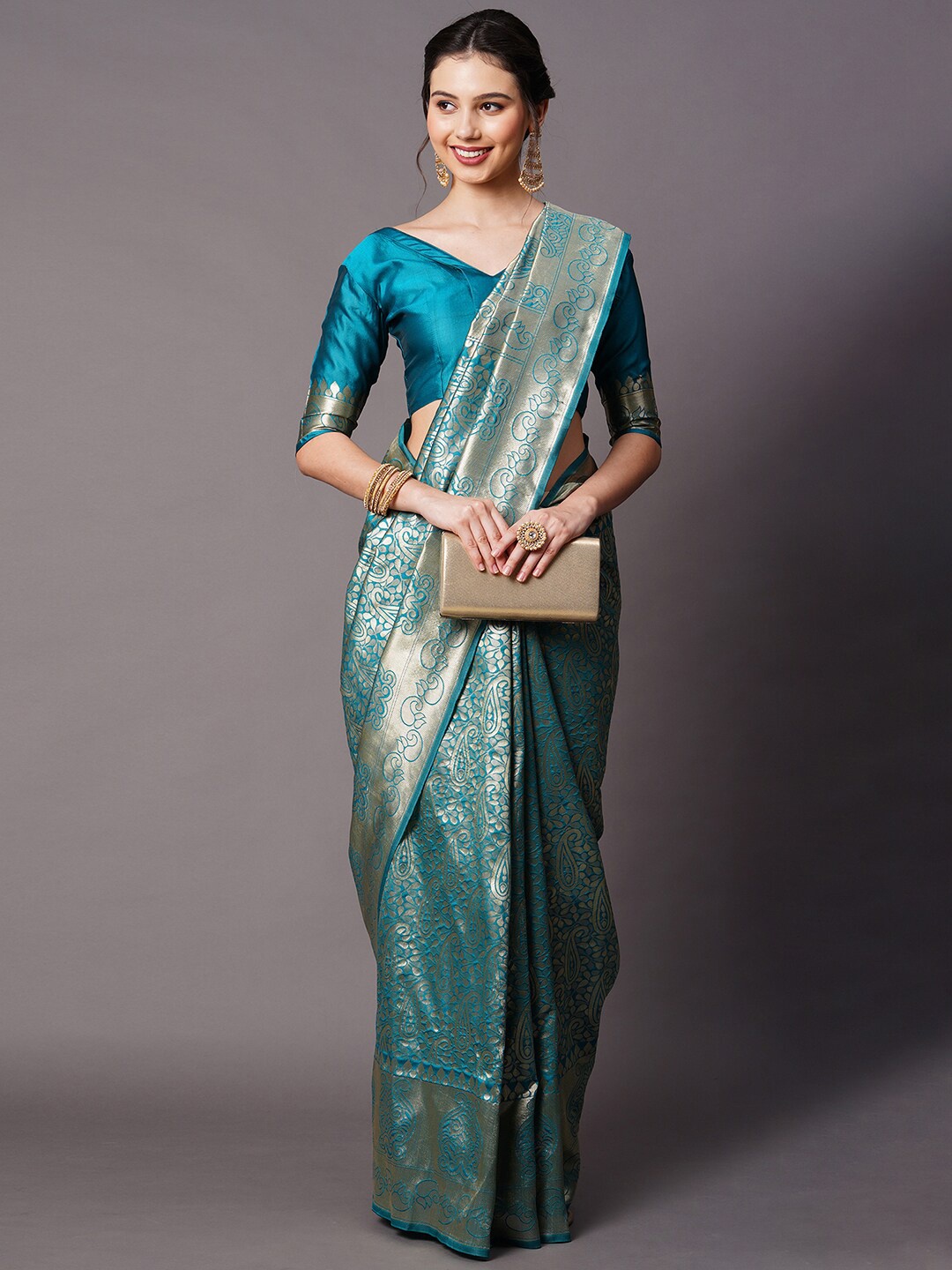 

Mitera Teal & Silver-Toned Paisley Woven Design Zari Banarasi Saree