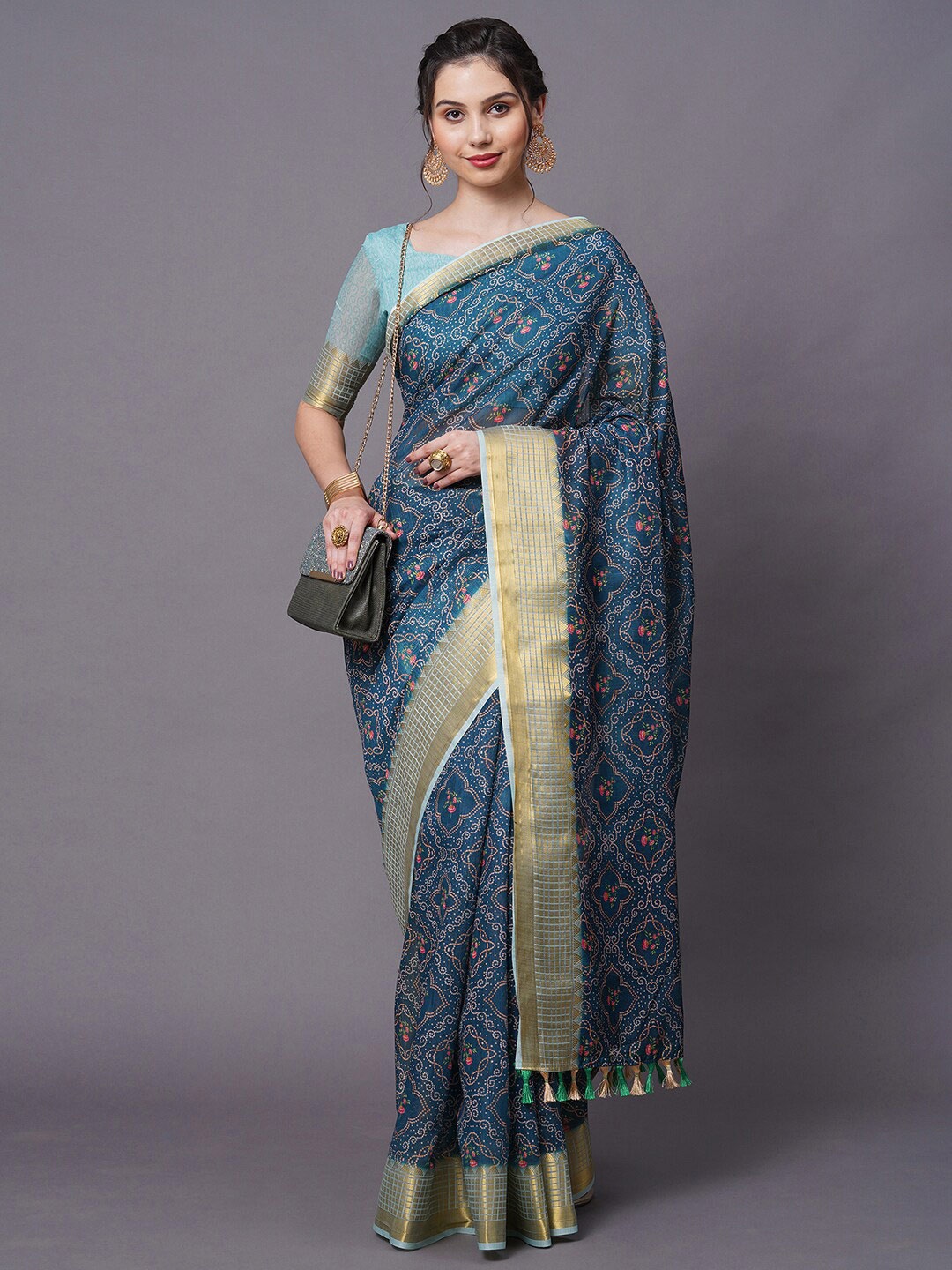 

Mitera Women Blue Printed Linen Blend Saree