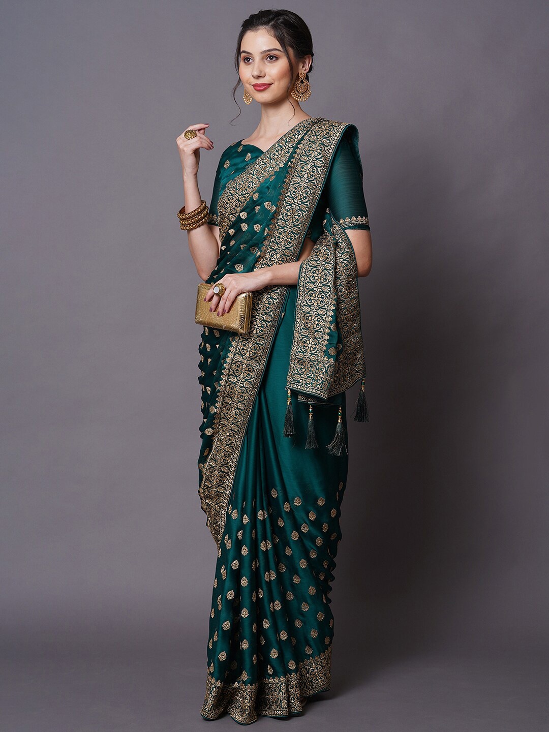

Mitera Teal & Gold-Toned Ethnic Motifs Zardozi Satin Saree