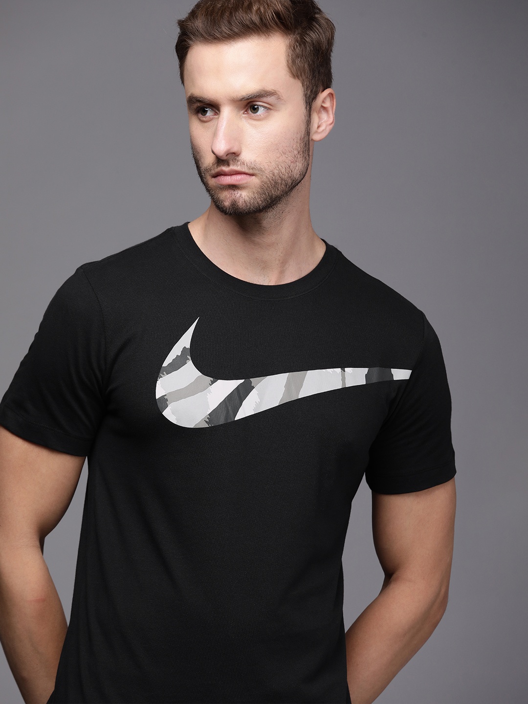 

Nike Men Black & White Brand Logo Printed Drit-Fit Round Neck Traning T-shirt