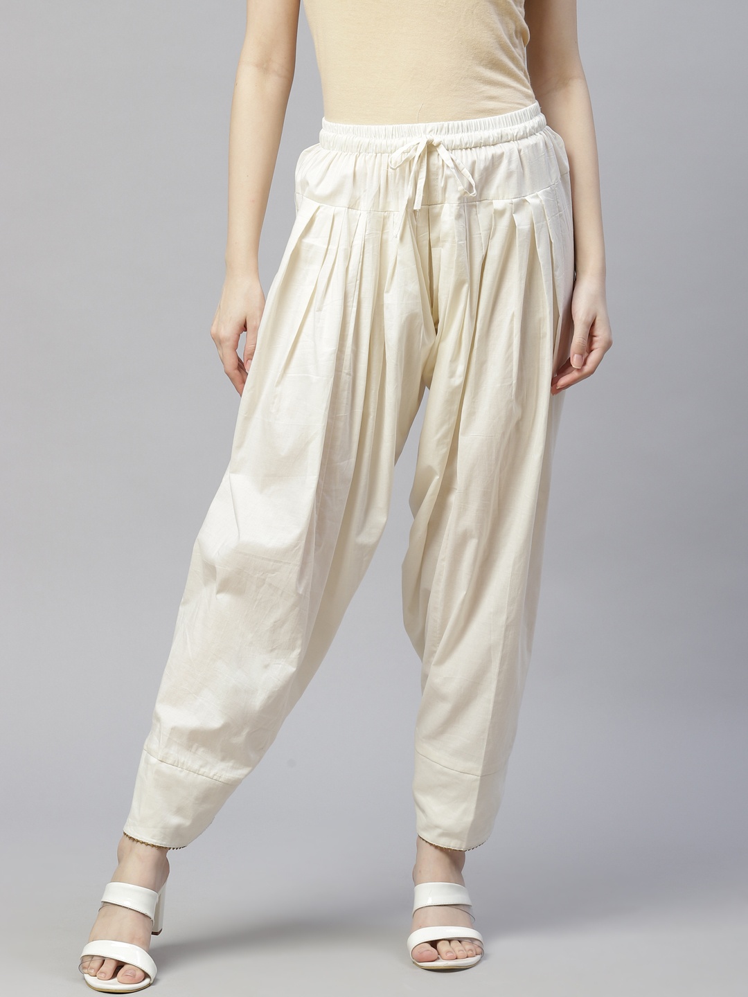 

Laado - Pamper Yourself Women Off-White Solid Pure Cotton Salwar