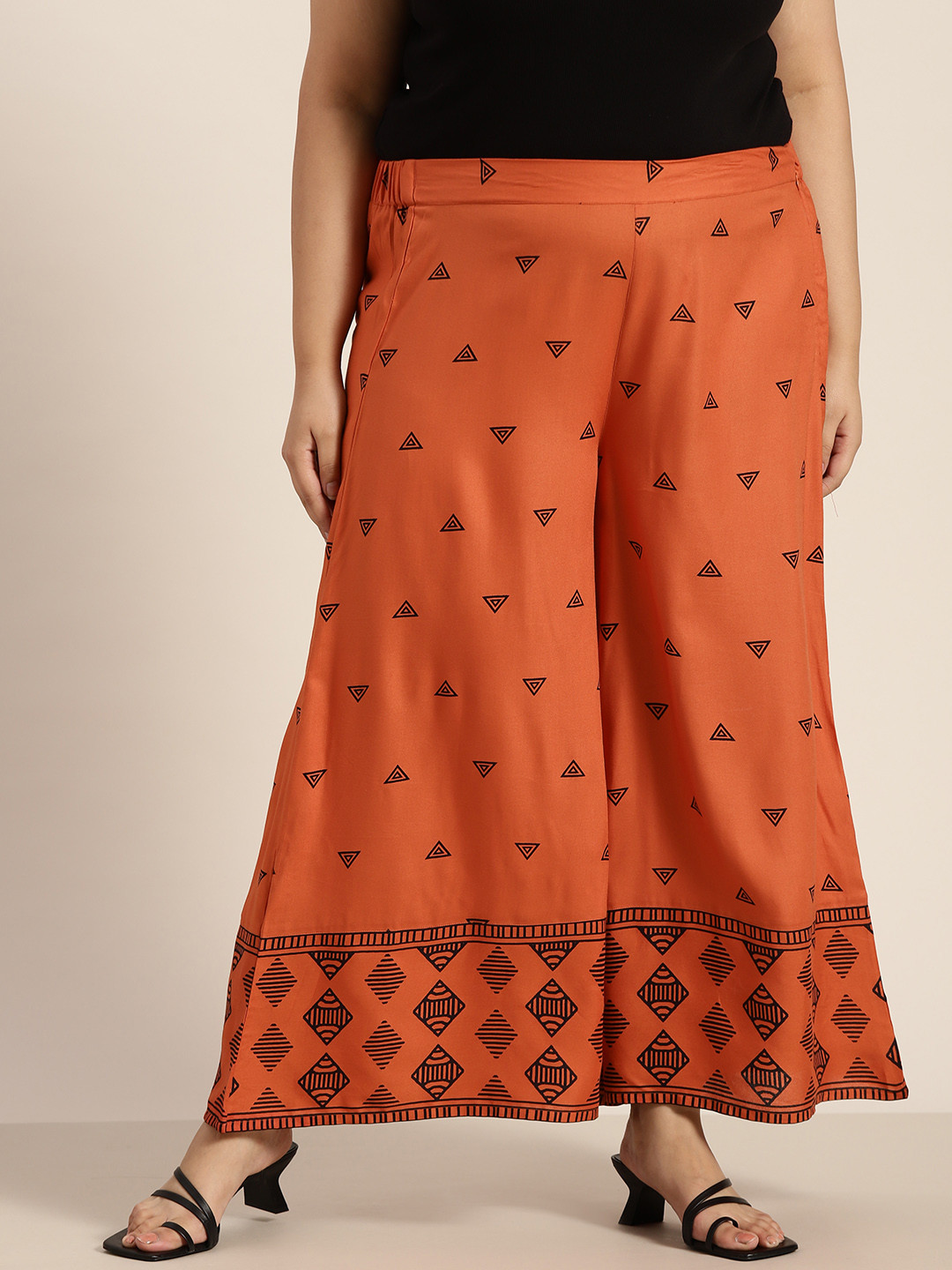 

Sztori Women Plus Size Orange & Black Geometric Printed Wide Leg Palazzos