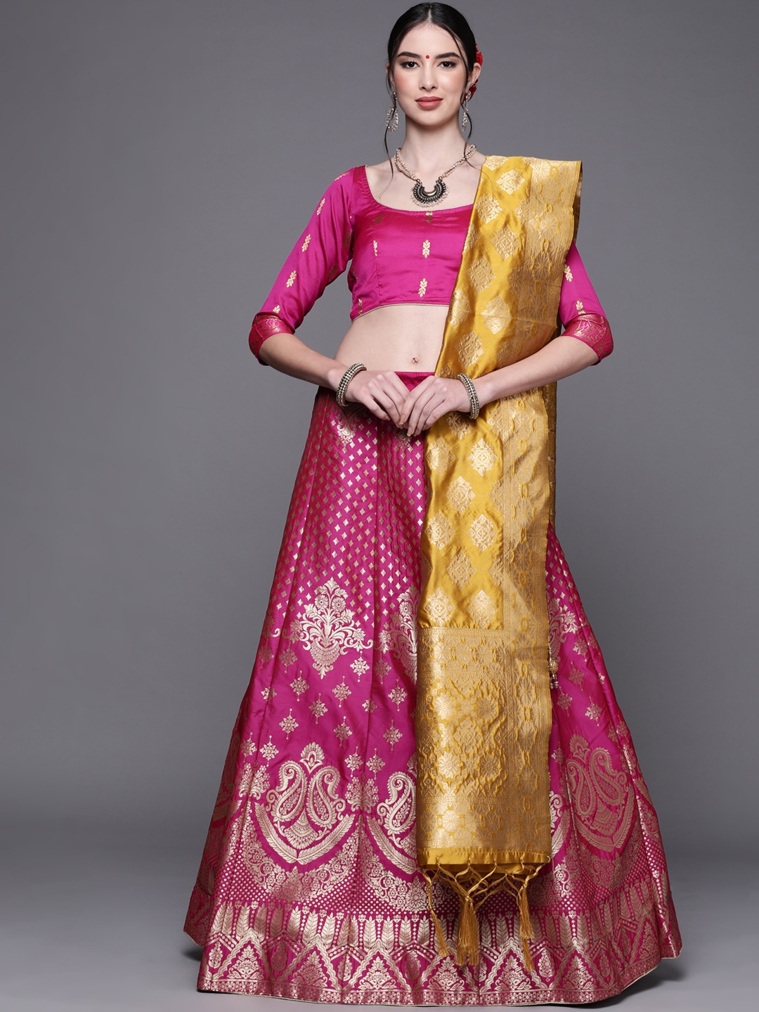 

Chhabra 555 Magenta & Gold Semi-Stitched Banarasi Zari Lehenga & Unstitched Blouse Dupatta