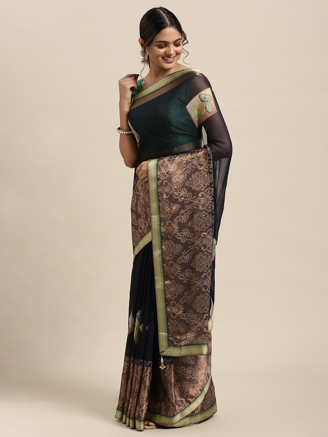 

Triveni Navy Blue Floral Zari Saree