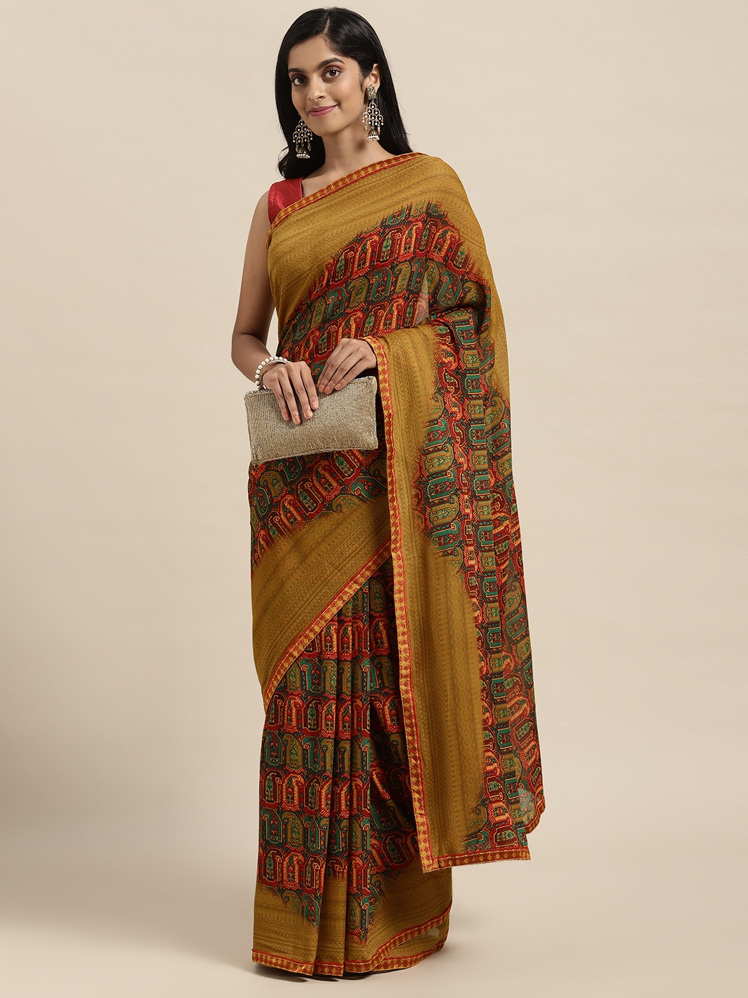 

Triveni Brown Pure Georgette Saree