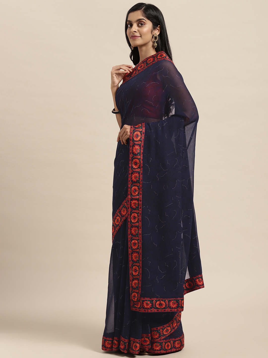 

Triveni Blue Floral Pure Georgette Saree