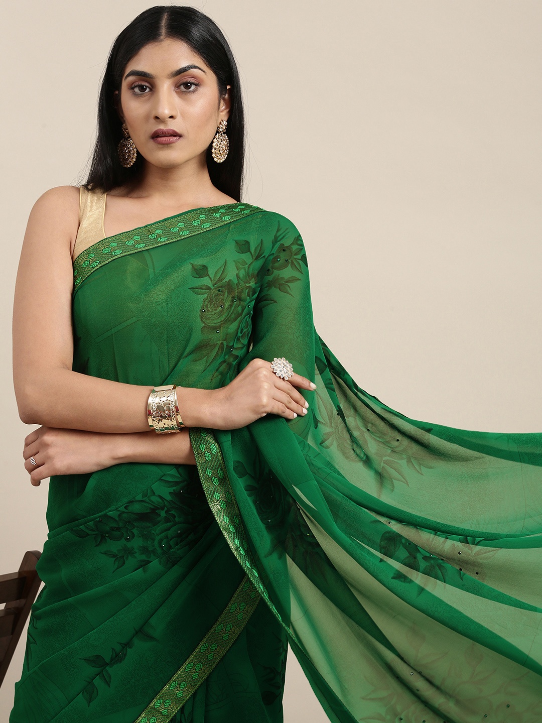 

Triveni Green Floral Beads and Stones Pure Georgette Saree