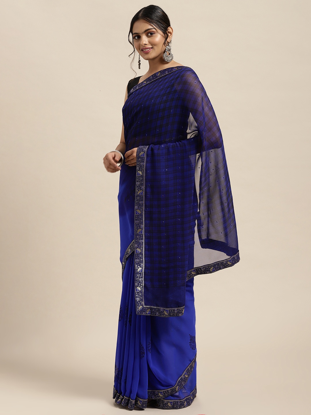 

Triveni Blue Beads and Stones Pure Georgette Saree