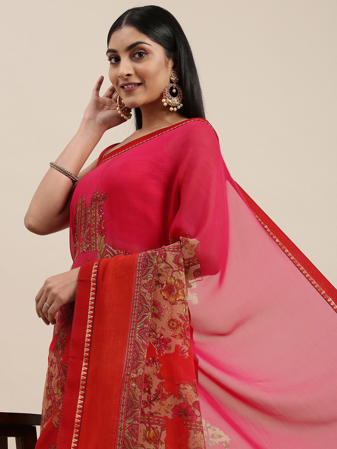 

Triveni Pink Ethnic Motifs Printed Saree
