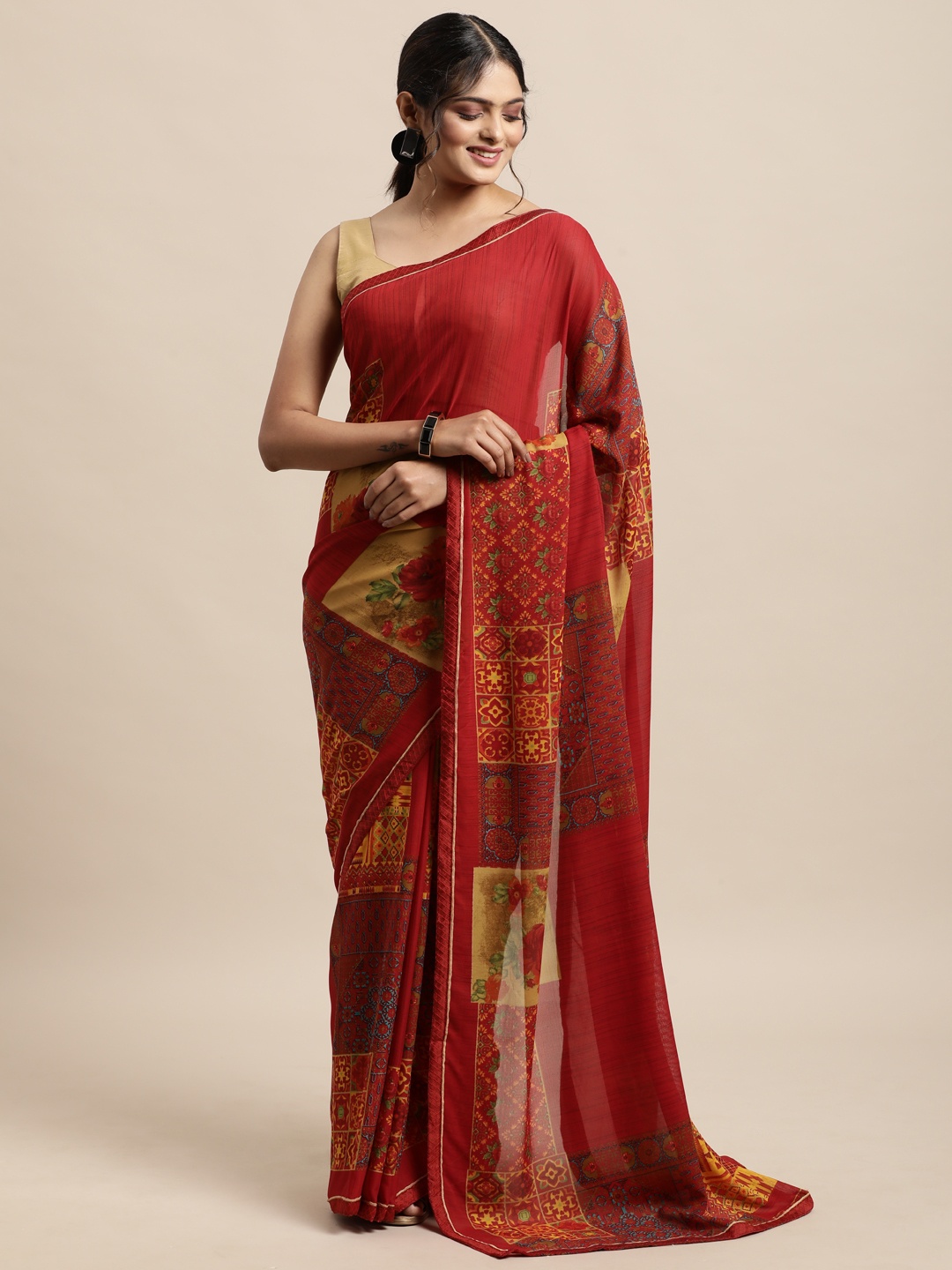 

Triveni Red Printed Pure Georgette Saree