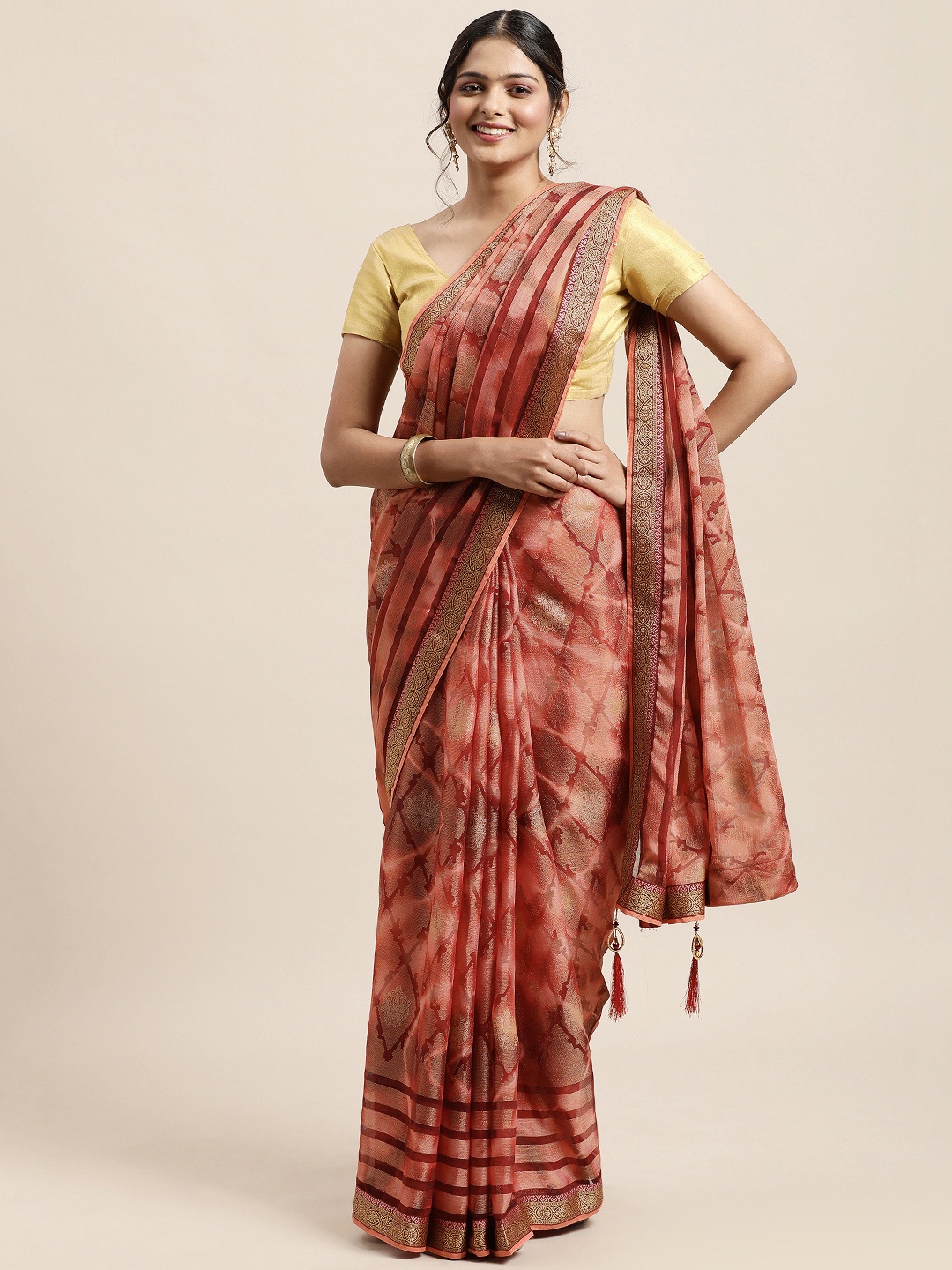 

Triveni Red Zari Brasso Saree