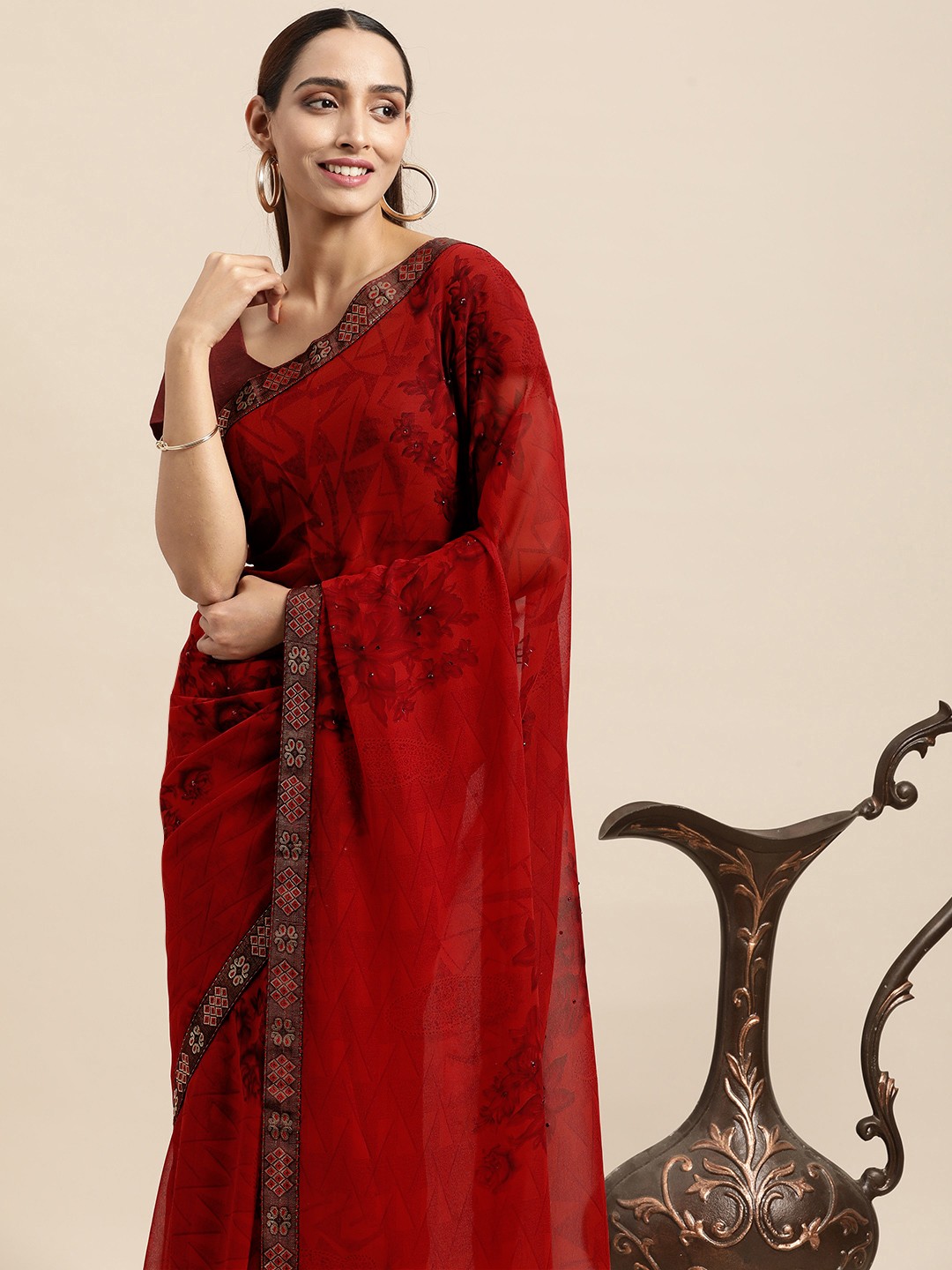 

Triveni Red Floral Beads and Stones Pure Georgette Saree