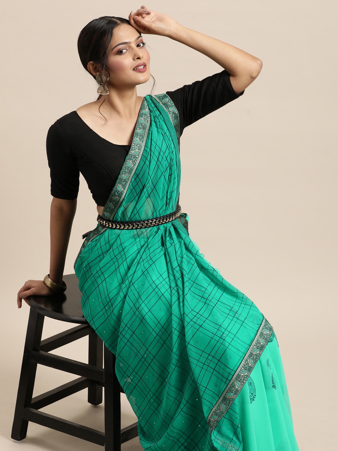 

Triveni Sea Green Beads and Stones Pure Georgette Saree