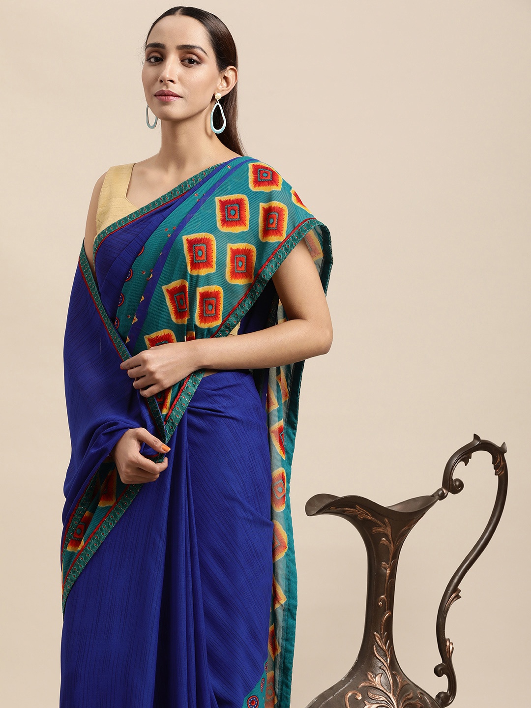 

Triveni Blue Pure Georgette Saree