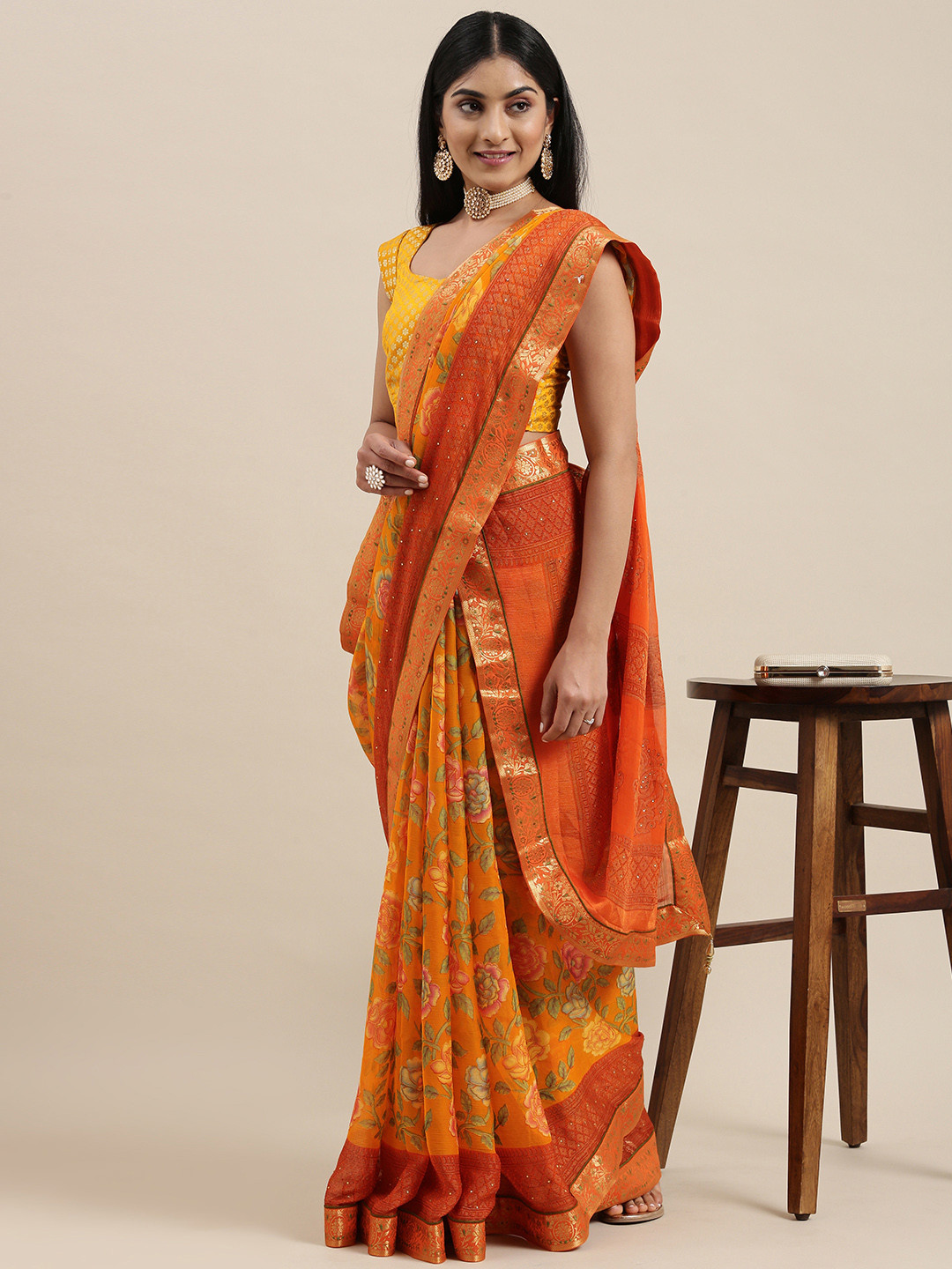 

Triveni Yellow Printed Pure Chiffon Saree With Blouse
