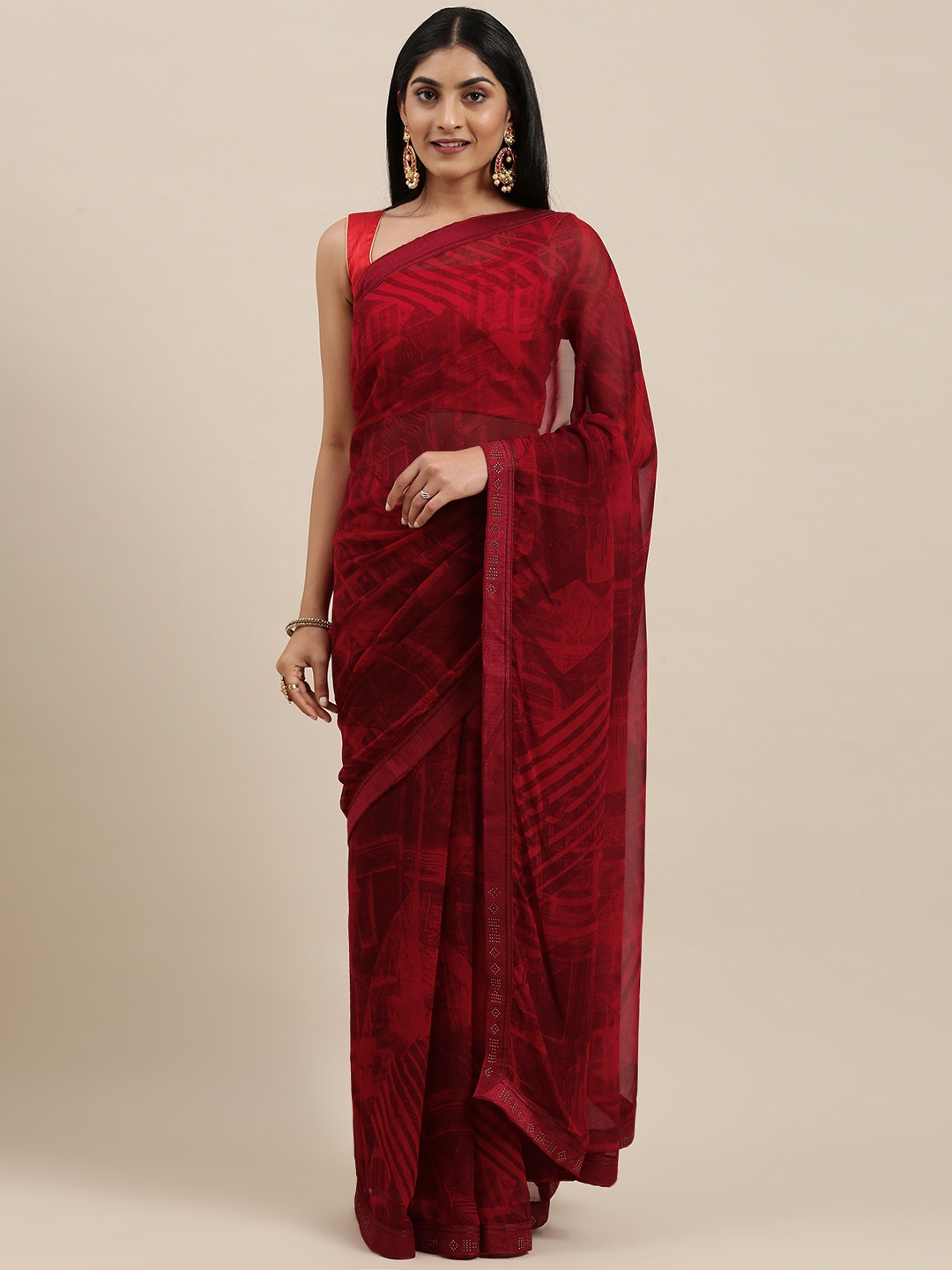 

Triveni Maroon Printed Pure Georgette Saree