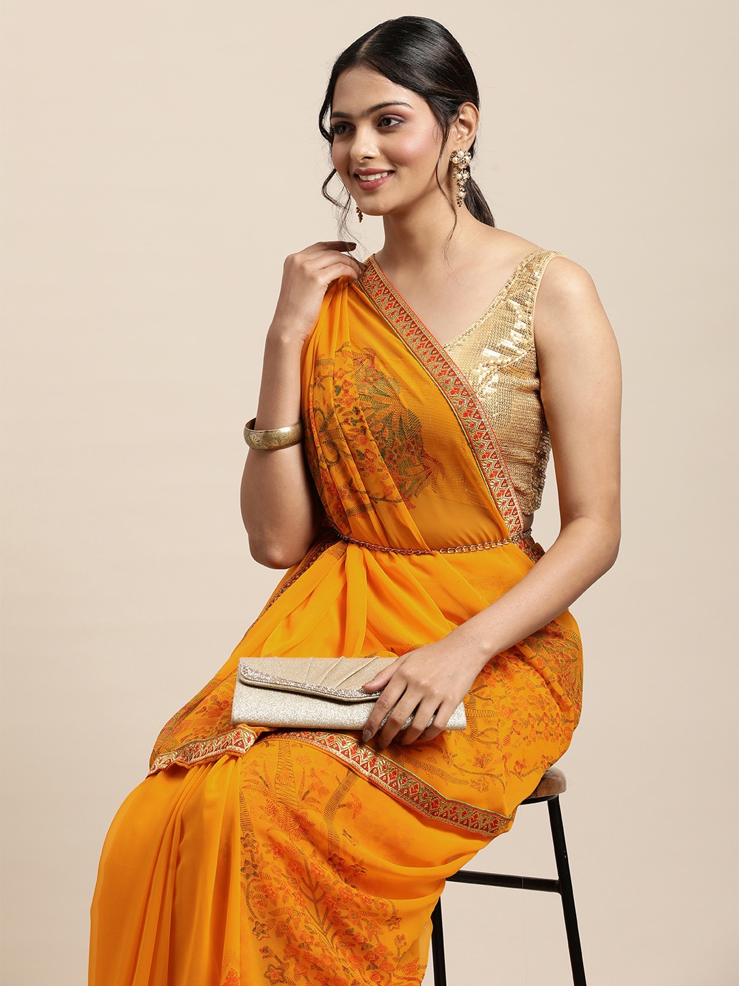 

Triveni Yellow Printed Poly Georgette Saree