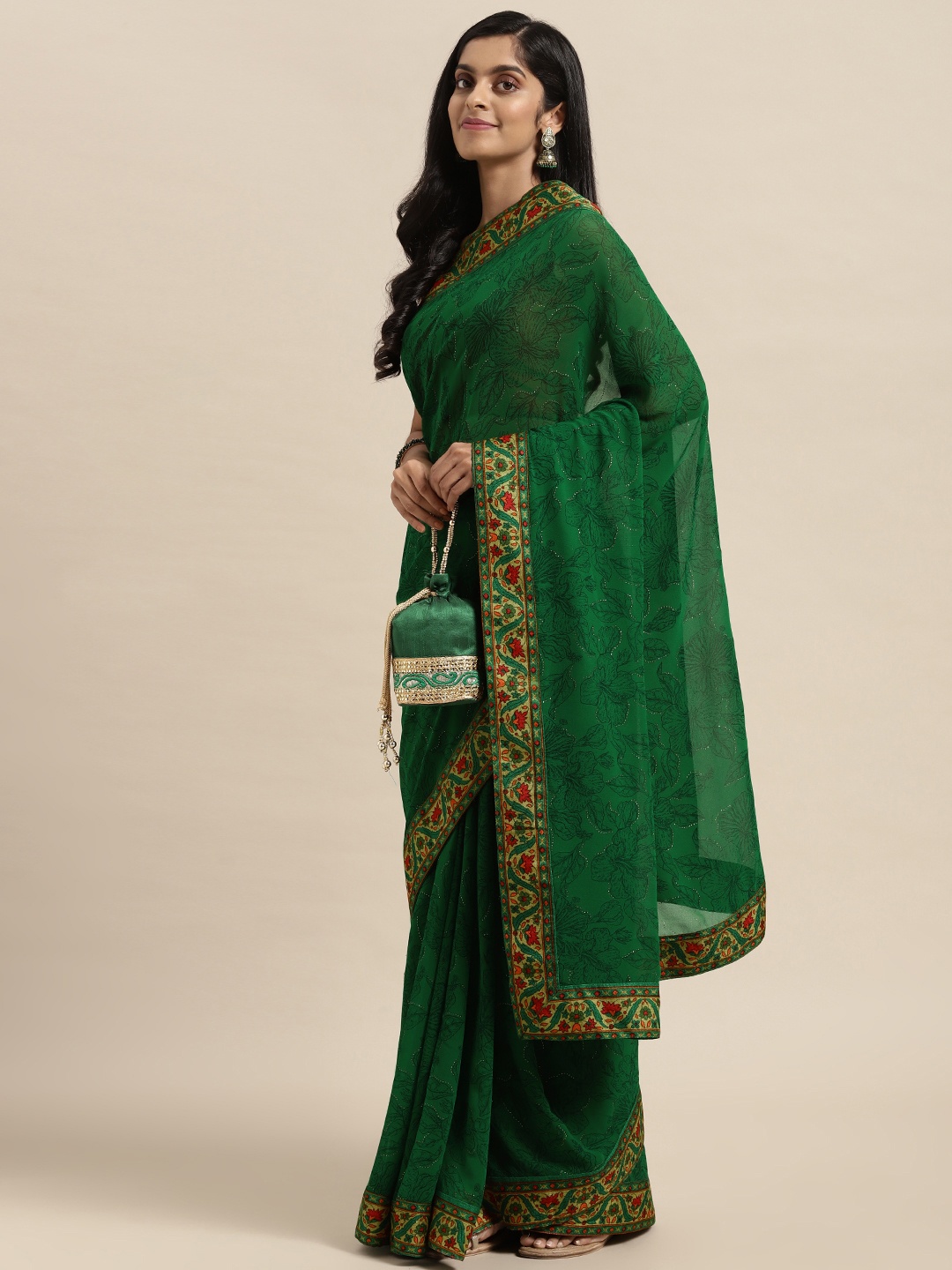 

Triveni Green Floral Pure Georgette Saree