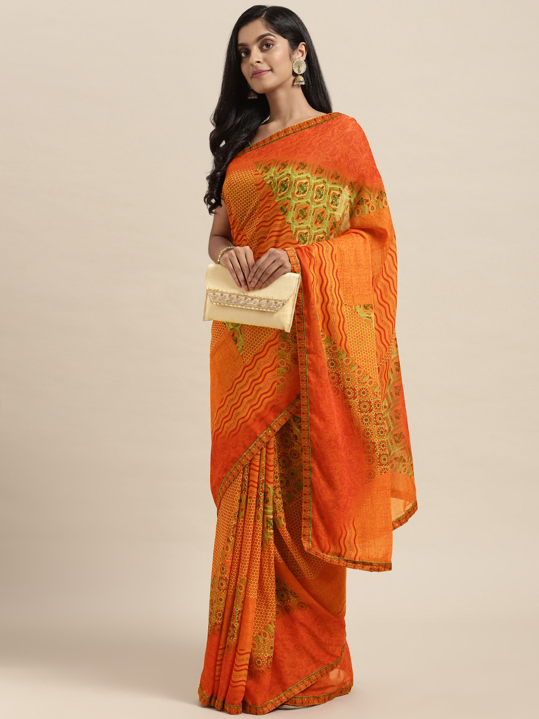 

Triveni Orange Pure Georgette Saree