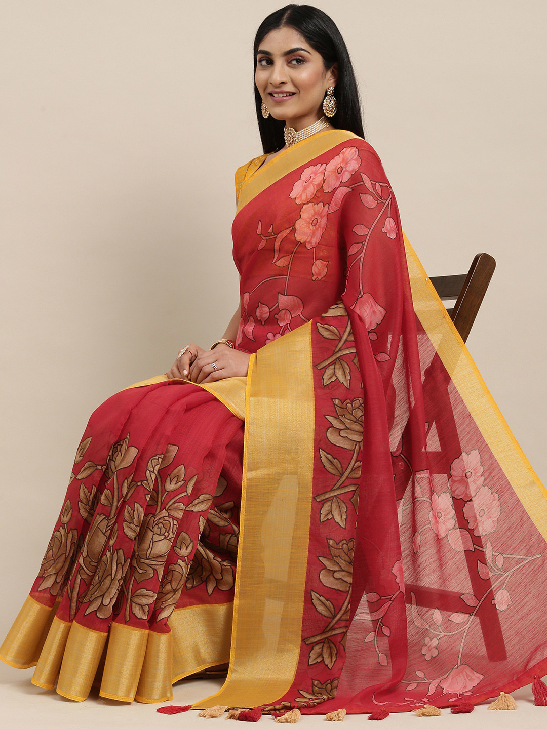 

Triveni Red Floral Saree