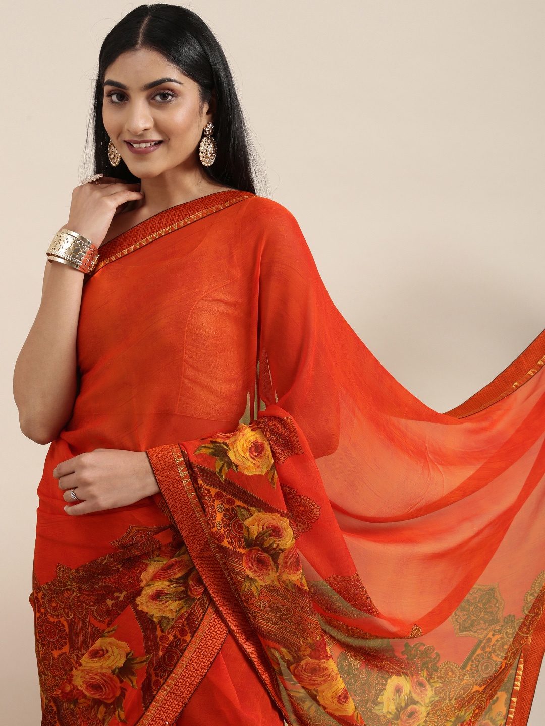 

Triveni Orange Floral Saree