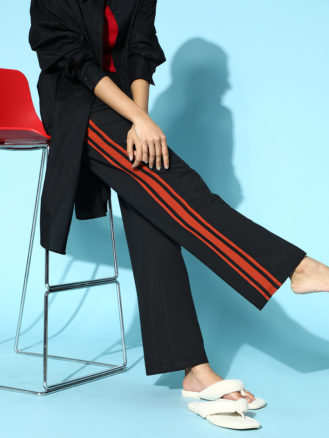 

ANWAIND Women Stylish Black Colourblocked Kick Flared Lounge Pants