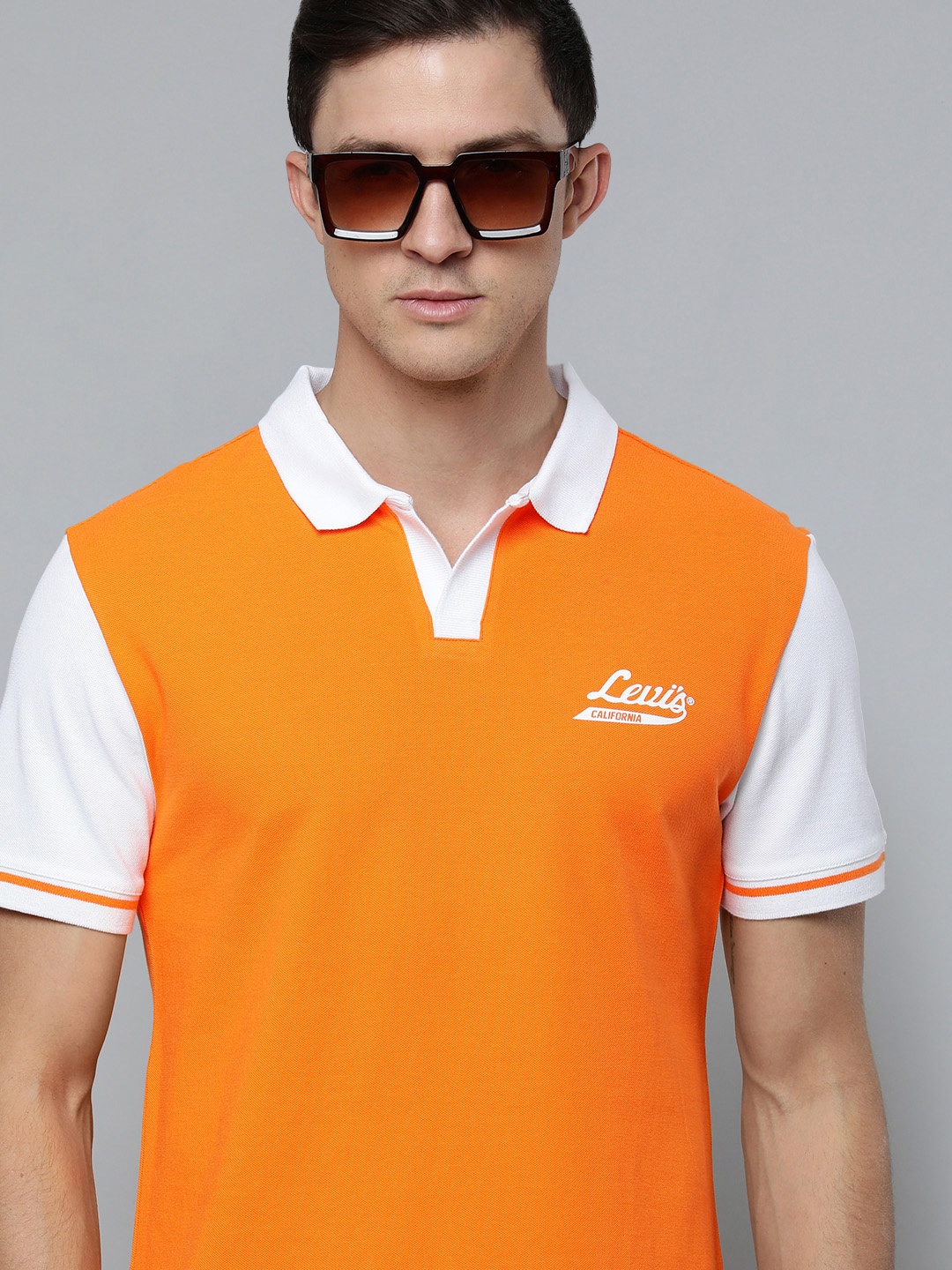 

Levis Men Orange & White Brand Logo Printed Polo Collar Pure Cotton T-shirt