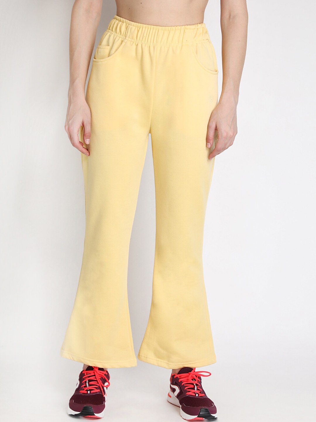 

CHKOKKO Women Yellow Solid Bootcut Track Pants