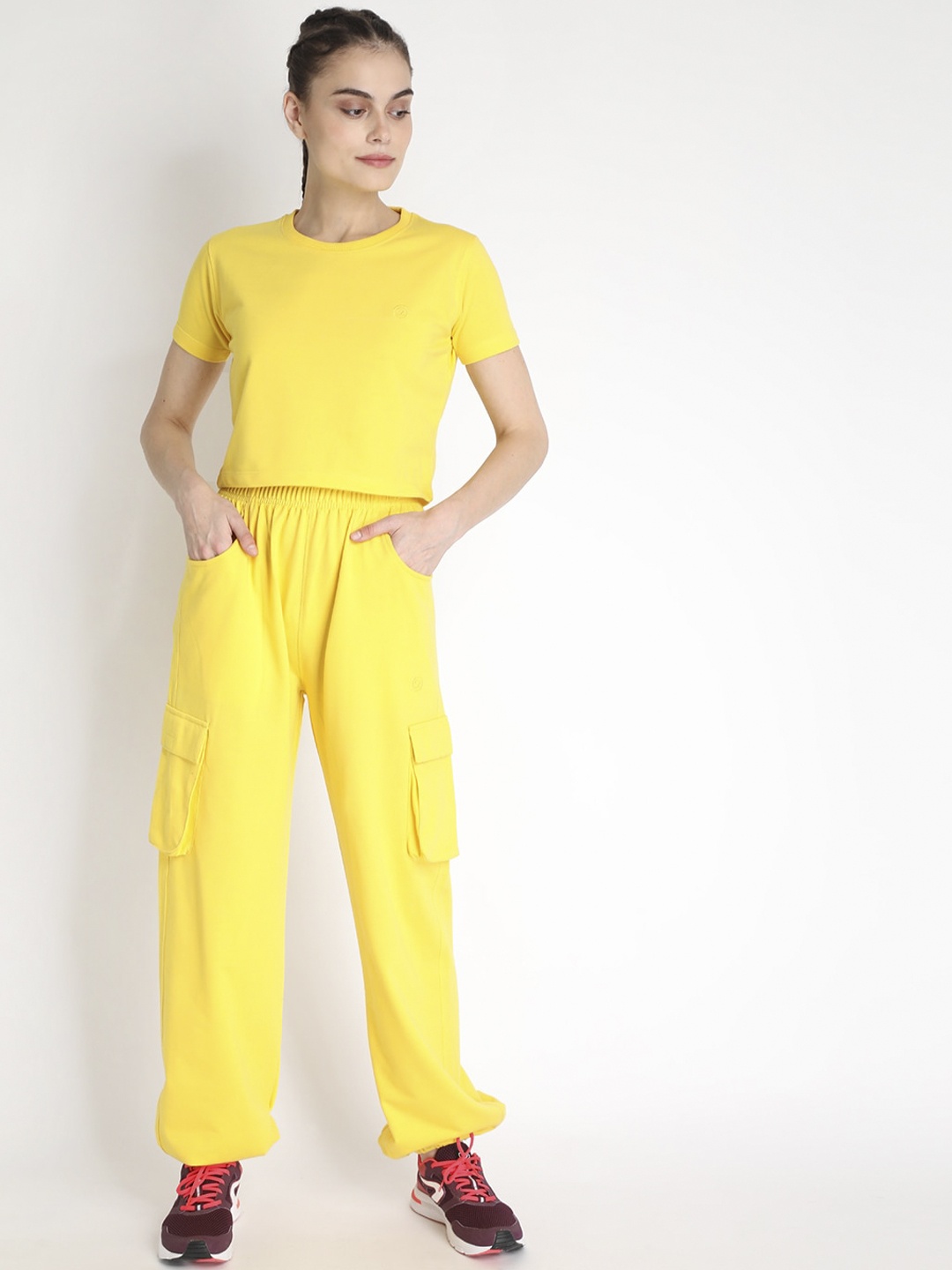 

CHKOKKO Women Yellow Solid Regular Fit Tracksuit