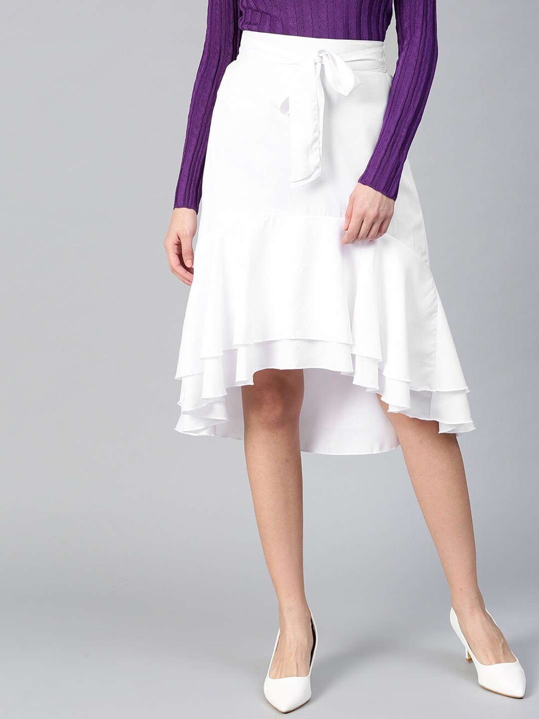

Bitterlime Women White Solid Peplum Knee-Length Skirt