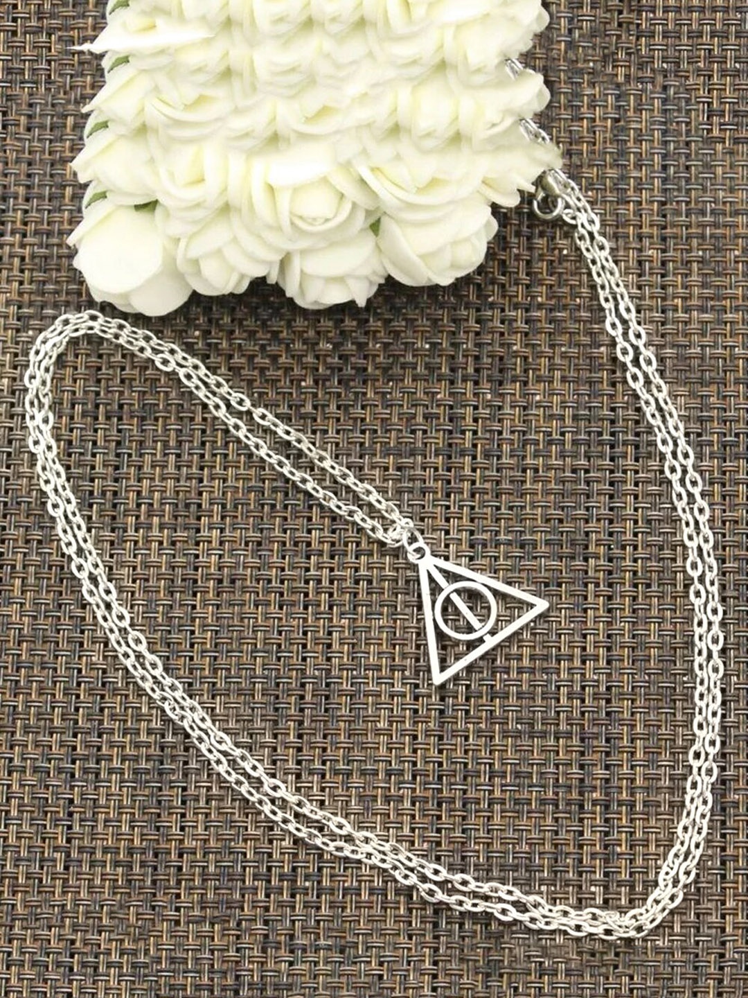 

Yellow Chimes Rhodium-Plated Stainless Steel Harry Potter Pendant With Chain, Silver