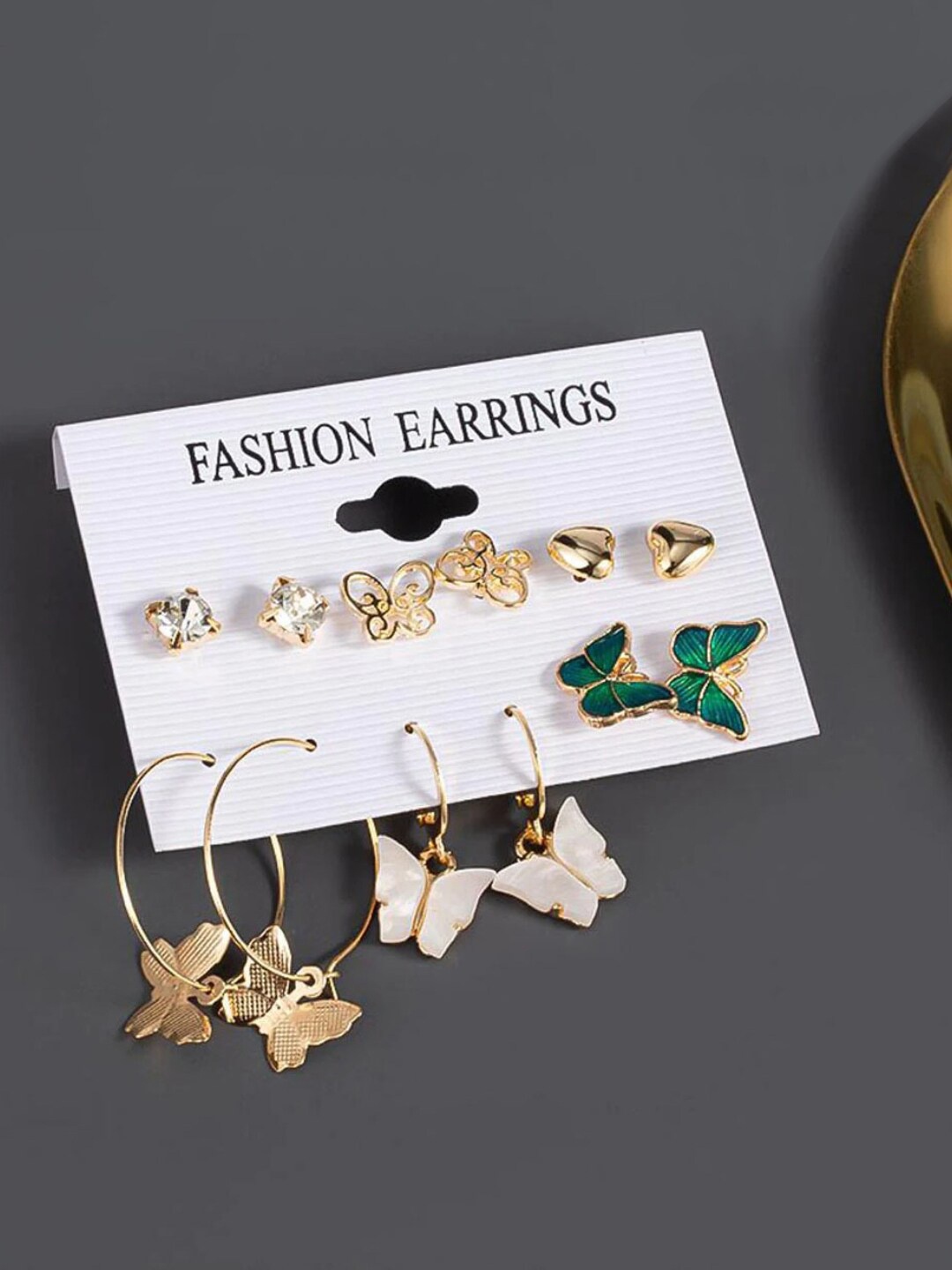 

Yellow Chimes Gold-Toned Contemporary Studs Earrings