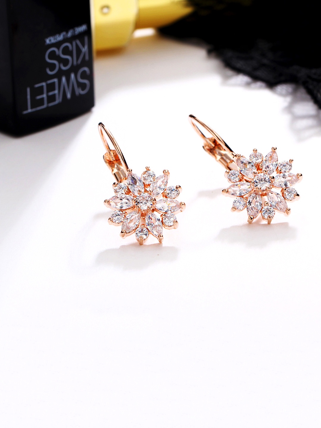 

Yellow Chimes Rose Gold-Toned Floral Crystal Studded Studs Earrings