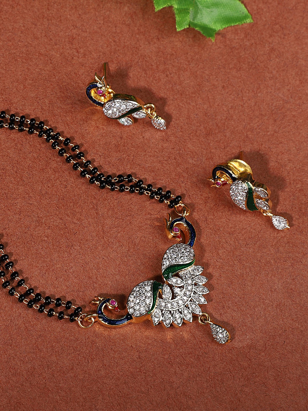 

ANIKAS CREATION Gold-Plated Black & White Stone-Studded Mangalsutra Set