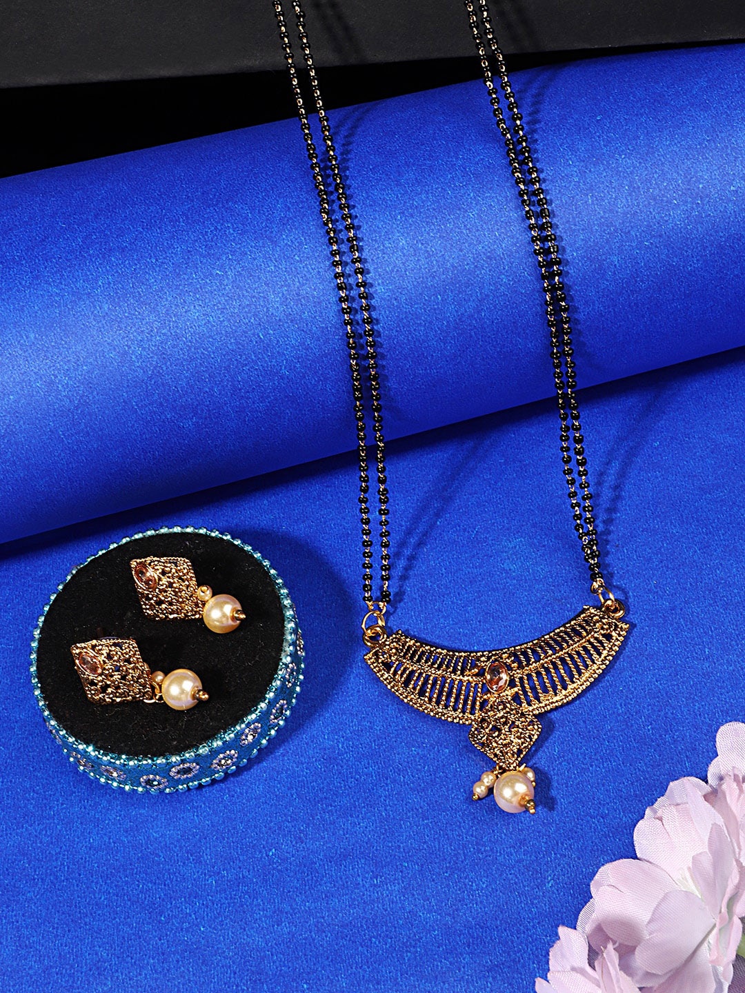 

ANIKAS CREATION Women Gold-Plated & Black Beaded Mangalsutra With Earrings