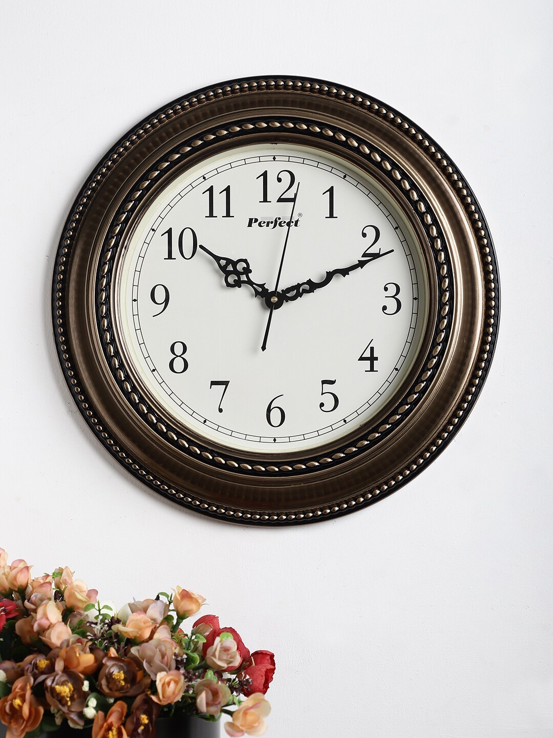 

EXIM DECOR Gold-Toned & White Contemporary Wall Clock