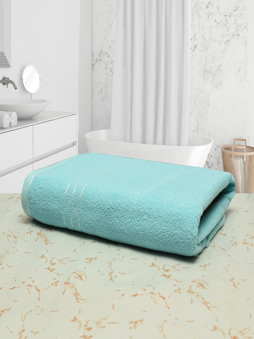 

Cotton Bolls Textiles Blue Solid 400 GSM Cotton Bath Towel