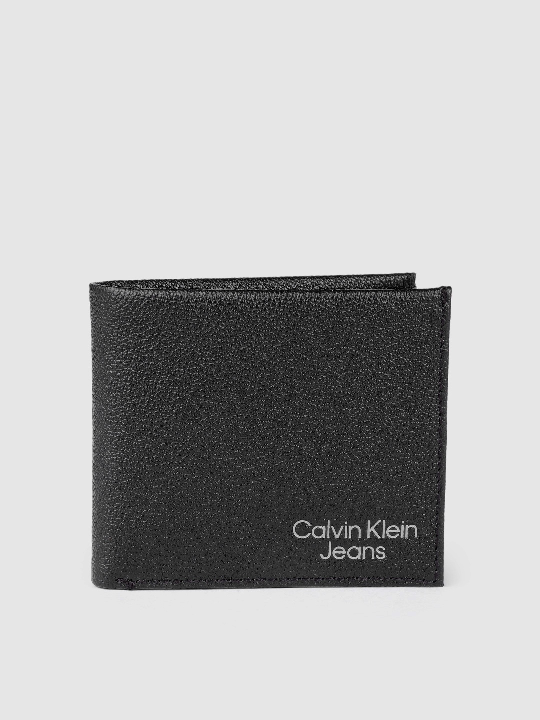 

Calvin Klein Men Black Solid Leather Micro Pebble Two Fold Wallet with Brand Logo Embossed